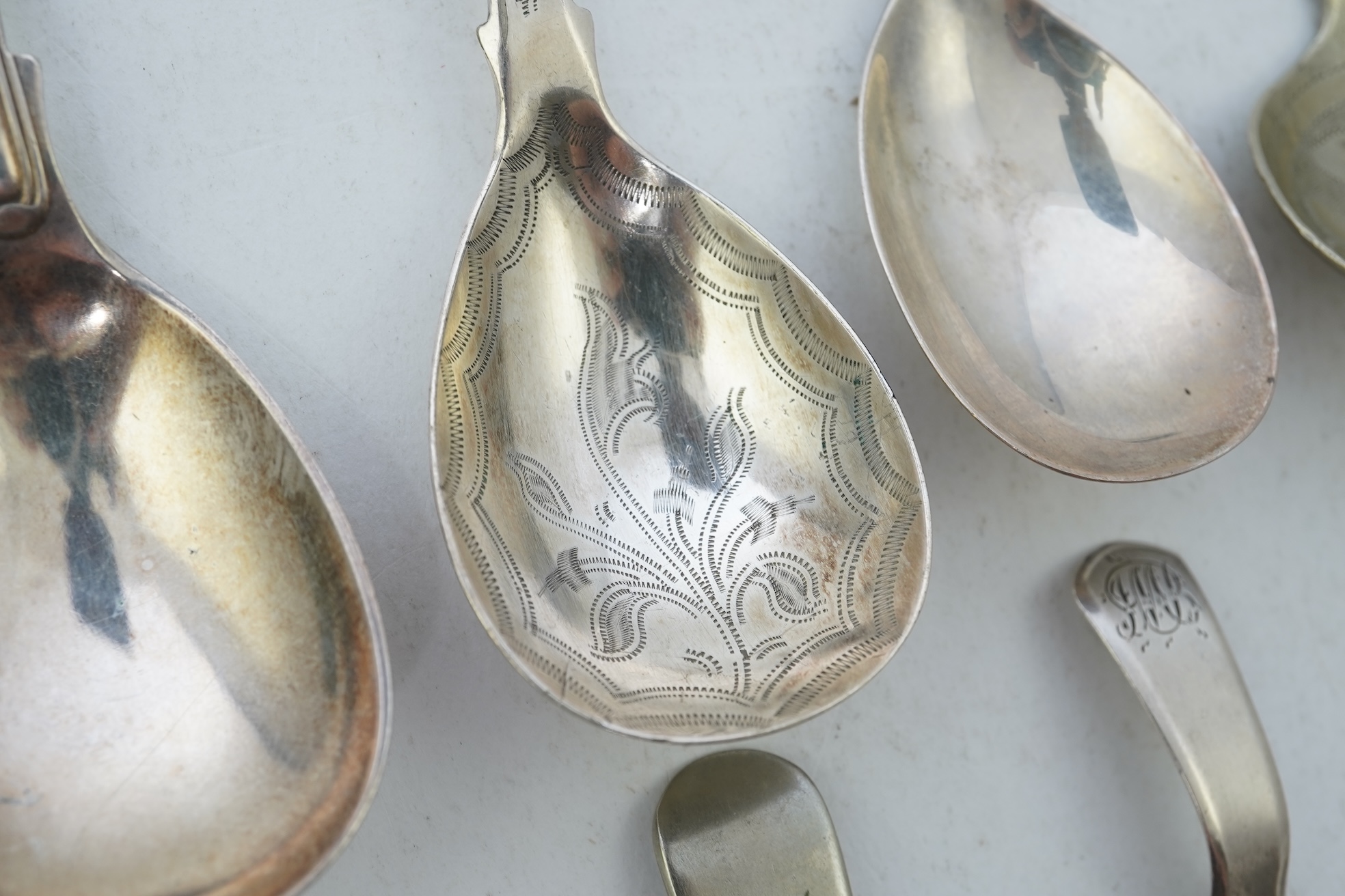 Nine assorted 19th century and later silver and white metal caddy spoons